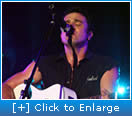 Shannon Noll playing guitar 2006 Gold Coast